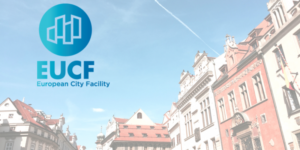European City Facility logo incrustado en una imagen de edificios.