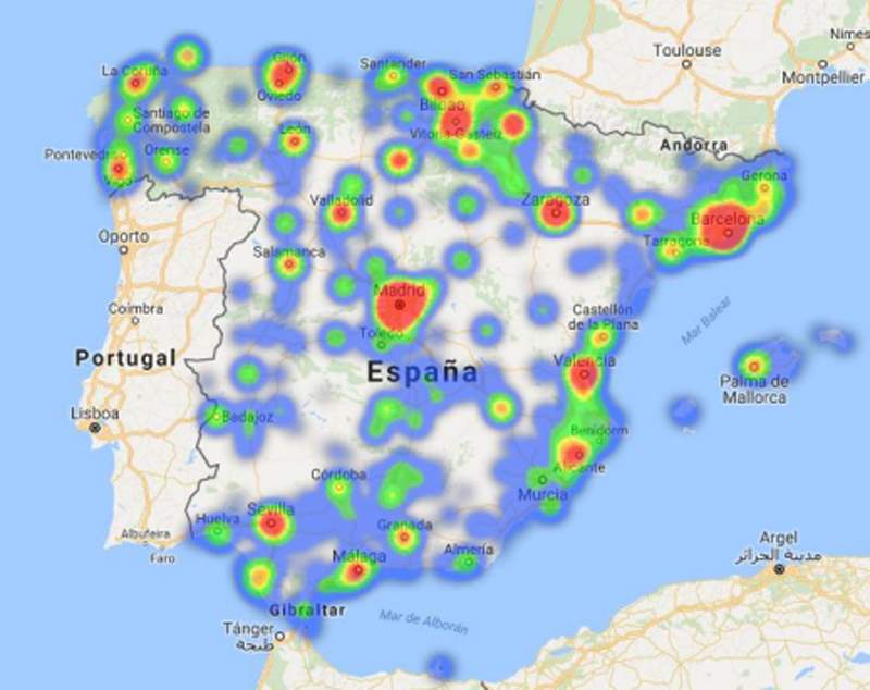 Mapa de España con círculos de colores rojos, azules, verdes y amarillos en función de la calefacción y refrigeración utilizada.