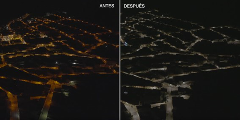 Vista aérea municipio iluminado de noche antes y después.